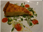 Parmesan tart with red pepper coulis